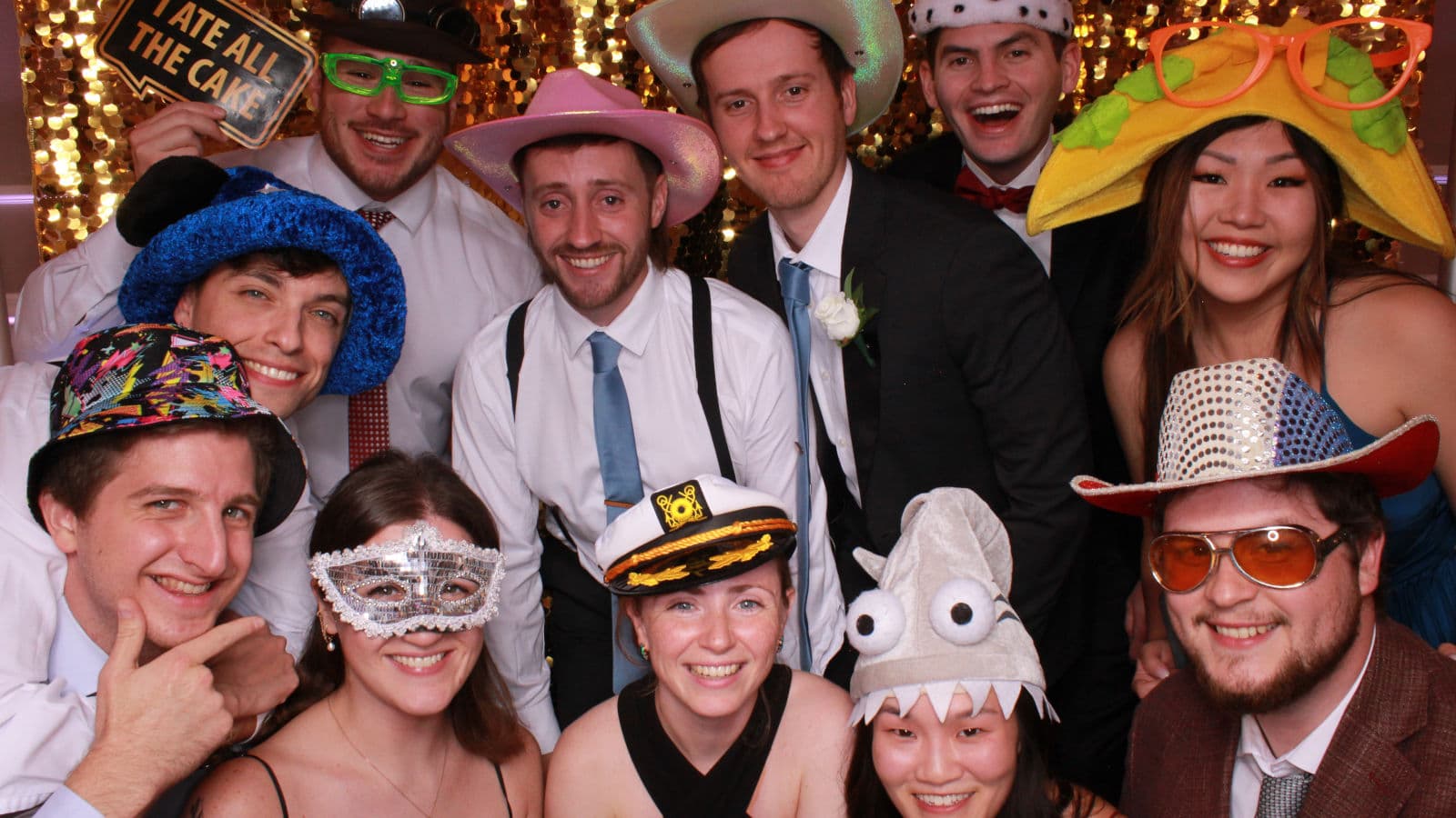 Guests laughing inside the open-air photo booth